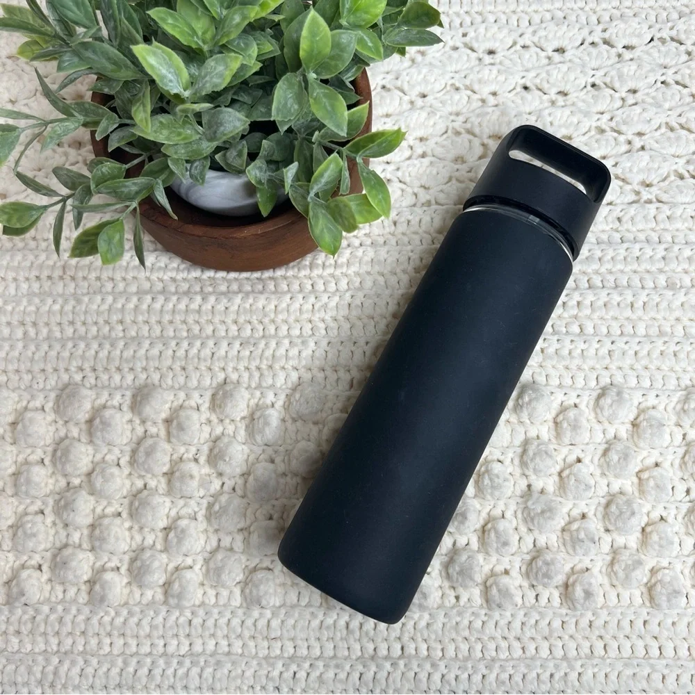 PELOTON Workout Glass Water Bottle with Lid Silicone Sleeve Black Logo